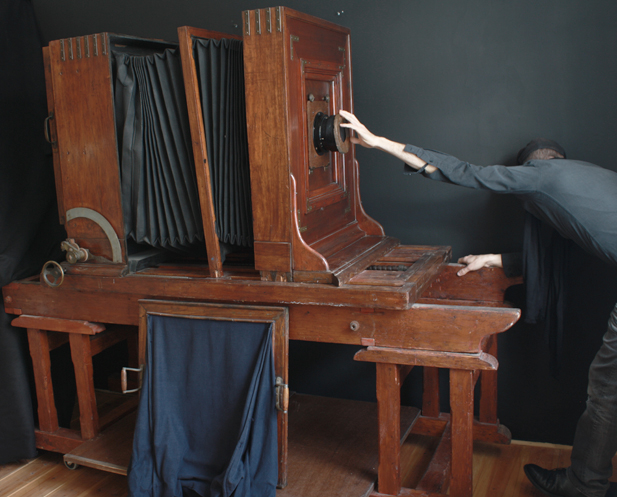 Anastassios Kavassis with an antique wooden camera ©anastassios kavassis